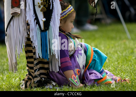 London, Canada - September 17, 2011: A First Nations Canadian wearing traditional clothing participates in a Pow Wow dance durin Stock Photo