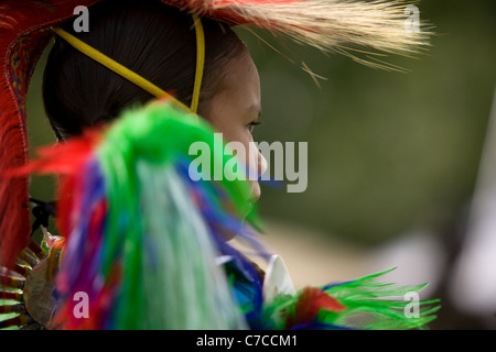 London, Canada - September 17, 2011: A First Nations Canadian wearing traditional clothing participates in a Pow Wow dance durin Stock Photo