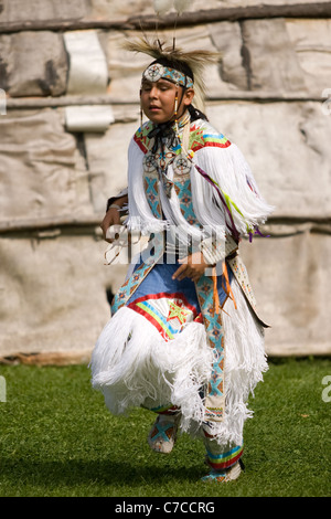 London, Canada - September 17, 2011: A First Nations Canadian wearing traditional clothing participates in a Pow Wow dance durin Stock Photo