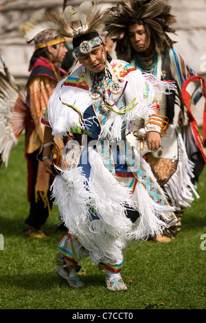 London, Canada - September 17, 2011: A First Nations Canadian wearing traditional clothing participates in a Pow Wow dance durin Stock Photo