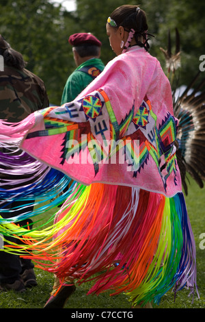 London, Canada - September 17, 2011: A First Nations Canadian wearing traditional clothing participates in a Pow Wow dance durin Stock Photo