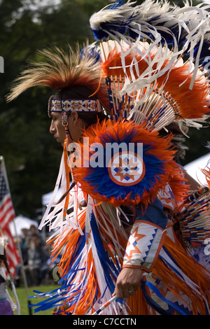 London, Canada - September 17, 2011: A First Nations Canadian wearing traditional clothing participates in a Pow Wow dance durin Stock Photo