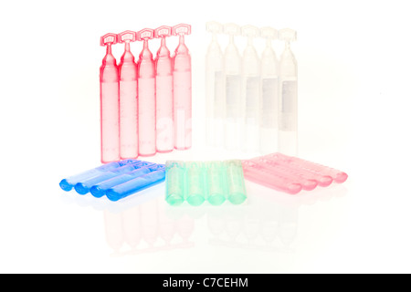 Plastic pharmaceutical containers used to store and deliver medication in a sterile manner. Stock Photo