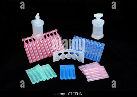 Plastic pharmaceutical containers used to store and deliver medication in a sterile manner. Stock Photo