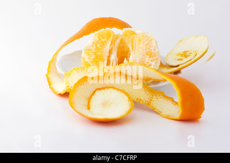 Orange fruit and peel on white background Stock Photo