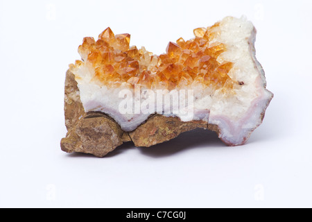 Raw citrine crystals on white background Stock Photo