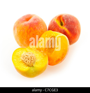 Few ripe peaches isolated on white background Stock Photo