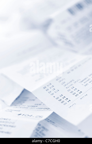 Paper cash register receipts in a lose pile close up Stock Photo