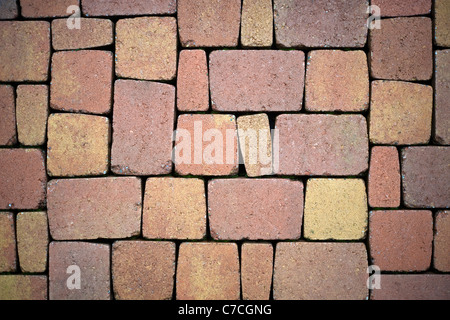 Background from paving stones, rectangular stones in red shades of color Stock Photo