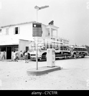 Historical picture from Brazil, 1950s by J. Allan Cash. Tourist coaches parked at a service or petrol station at Rio de Janeiro. Stock Photo
