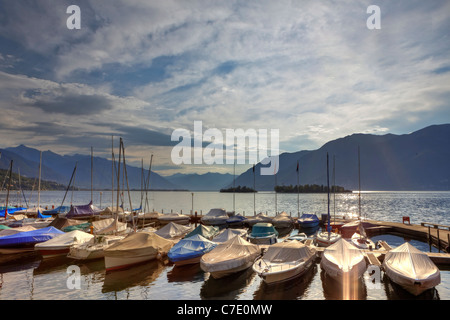 The port of Porto Ronco with morning sun w ith the Brissago Islands in the background Stock Photo