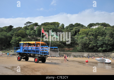 South Sands  Ferry 'Sea Tractor' take people  ashore up South Sands beach  from their ferry boat, Salcombe, Devon, England, UK Stock Photo