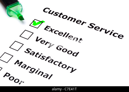 Customer service survey with green tick on Excellent with felt tip pen.