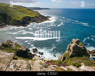 Section of the South West coast path looking across Porthmeor cove near Zennor in West Penwith Cornwall towards Pendeen Watch Stock Photo