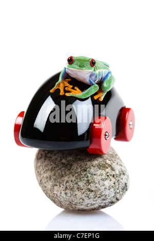 Car toy and crazy frog Stock Photo