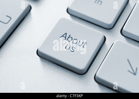 About us button on the keyboard. Toned Image. Stock Photo