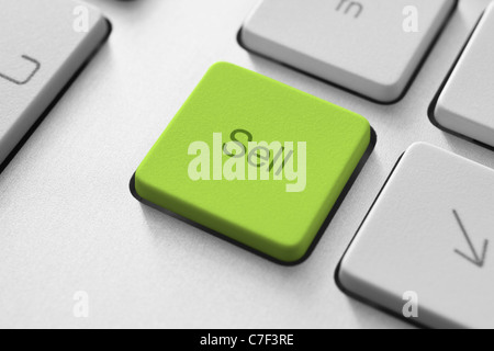 Sell button on the keyboard. Toned Image. Stock Photo