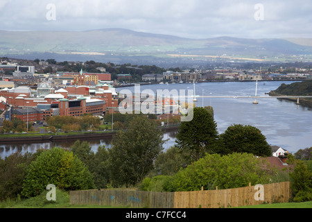 river foyle with new peace bridge in derry city county londonderry northern ireland Stock Photo