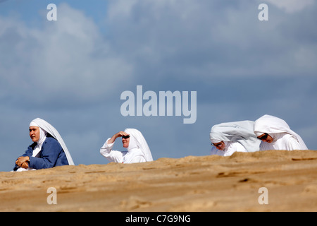 Nuns at the beach (Hossegor - France). Religieuses novices à la plage (Hossegor - France). Stock Photo