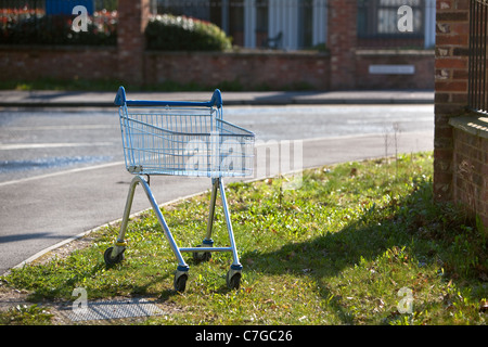 discarded shopping trolley left on streets far from supermarkets. Salisbury England UK Stock Photo