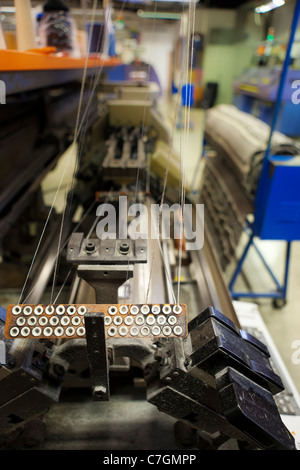 Machine in process of knitting a blanket, Hvammstangi, Iceland Stock Photo