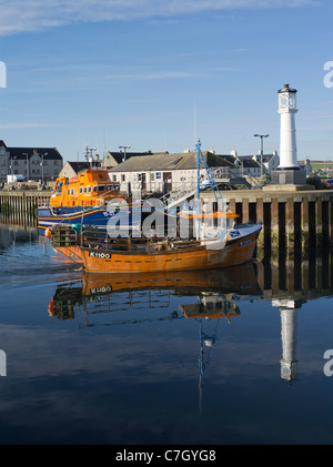 dh Kirkwall harbour creel boat KIRKWALL ORKNEY Crab boats leaving harbour lifeboat rnlb volunteer spirit harbour Stock Photo