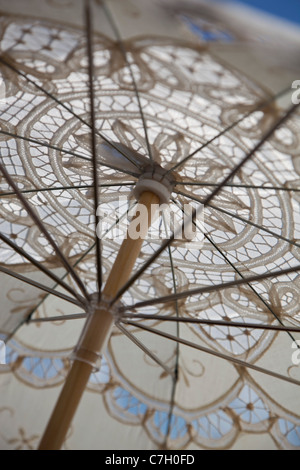 A lace parasol, low angle view, close-up, full frame Stock Photo