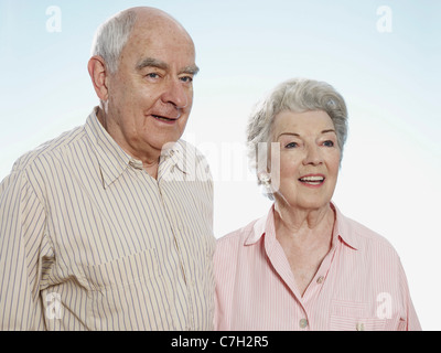 Senior couple look into distance Stock Photo