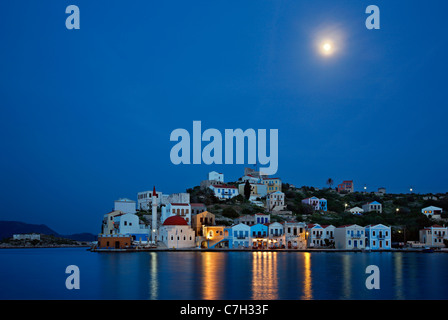 Night  view (full moon) of the picturesque village of Kastellorizo (or 'Meghisti') island, Dodecanese, Greece Stock Photo