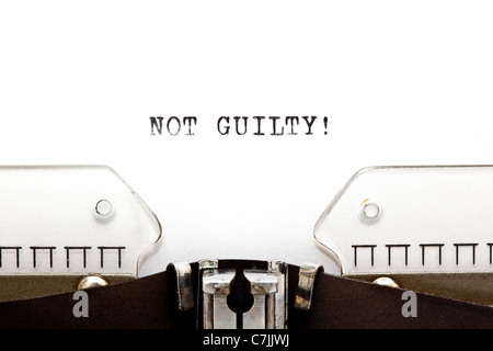 Concept image with NOT GUILTY! written on an old typewriter Stock Photo