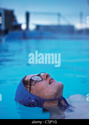 Man swimming in eyeglasses Stock Photo