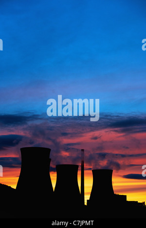 Silhouette of coal plant cooling towers Stock Photo