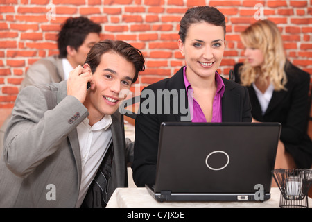 Business students in a restaurant Stock Photo