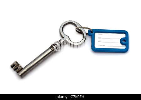 Key with a blank tag closeup on white background Stock Photo