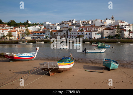 Portugal, Algarve, Ferragudo, Village & Boats on the Beach Stock Photo