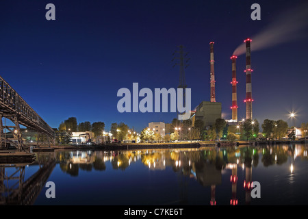 Industrial landscape. Heat station and the river. Stock Photo