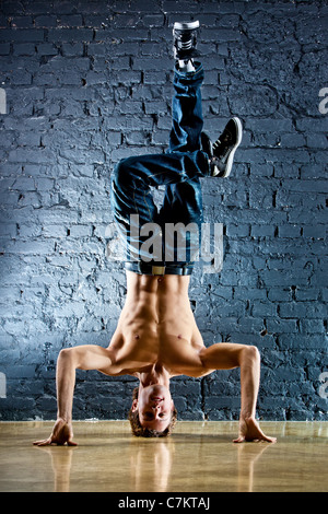 Young strong man break dance. Stock Photo