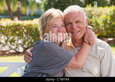 Portrait of a romantic couple in a park Stock Photo