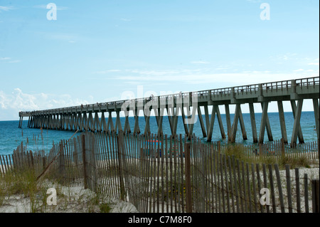 Navarre Beach Fishing Pier extending out into the Gulf of Mexico in Navarre Beach, Florida Stock Photo