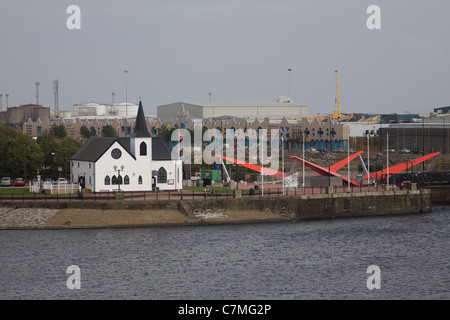 Norwegian Church and new bridge, Cardiff Bay, with the BBC Drama Village in the distance Stock Photo