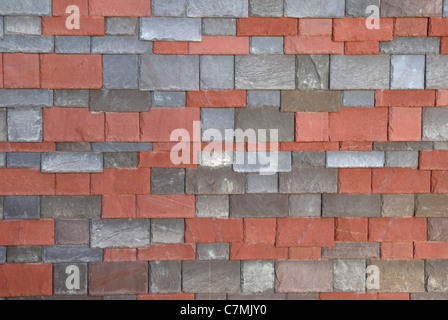 red and gray slate shingles in rows Stock Photo