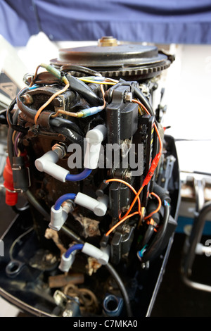 rear of an old 2 stroke outboard motorboat engine Stock Photo