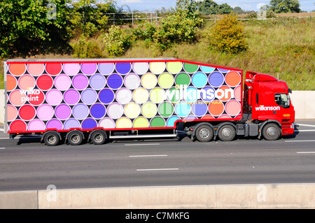 Wilko colourful paint brand advert on side Wilkinson discount chain store articulated trailer supply chain hgv delivery lorry truck m25 motorway UK Stock Photo