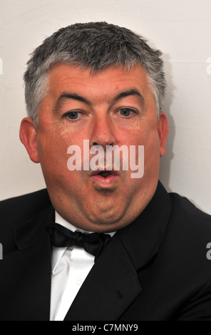 UK, John Parrott, professional, and former World Champion, snooker player and TV personality playing a set of exhibition games Stock Photo