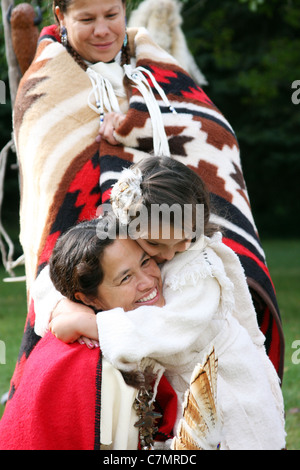 Native American Indian family mom and daughter hug Stock Photo