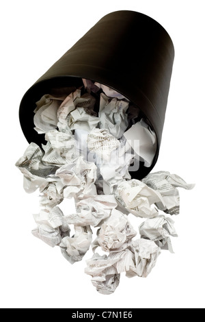 Spilled wastepaper basket full of crumpled paper isolated on white background Stock Photo