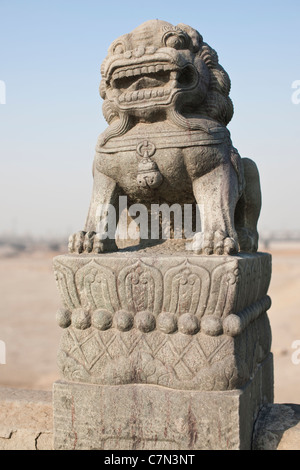 Stone lions on Lugou Qiao (Marco Polo bridge) Stock Photo