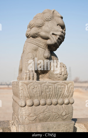 Stone lions on Lugou Qiao (Marco Polo bridge) Stock Photo