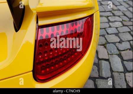 Tail light, Porsche Carrera GT in yellow, rare, super sports car, Hamburg, Germany, Europe Stock Photo