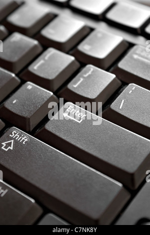 Closeup of the keys on a black colored computer keyboard. Shallow depth of field. Stock Photo